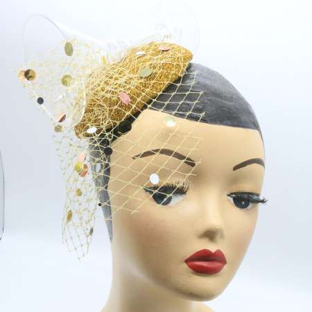 fascinator gold Sektglas