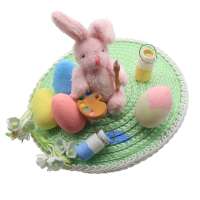 Fascinator in mint green with painted Easter bunny