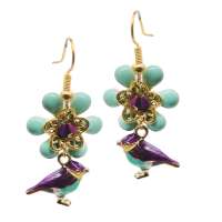 Earrings with a small golden and purple bird